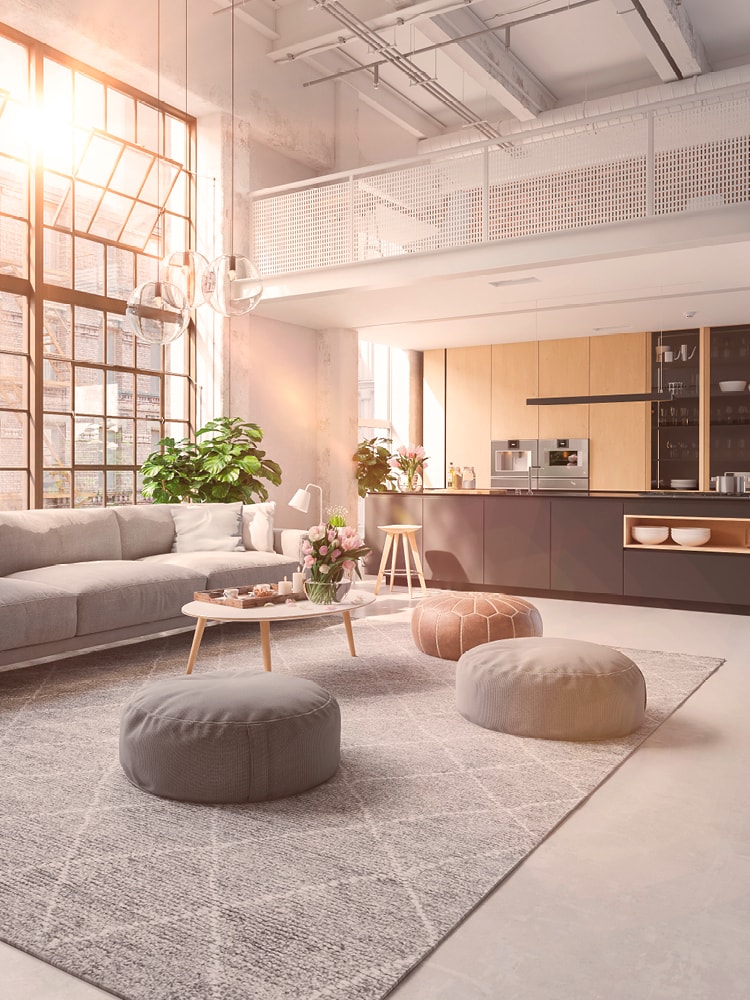 Ein modernes Apartment mit großen Fenstern, durch die warmes Licht in die Wohnung fällt