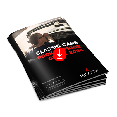 Ein Stapel der Hiscox Classic Cars Pocket Price Guides 2023, versehen mit einem Download-Symbol im Vordergrund.